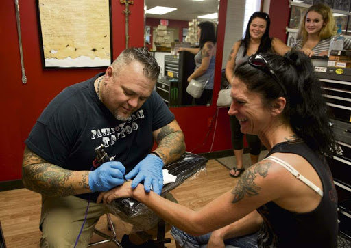 Explore 1986 tattoo ideas, creative tattoo ideas in Export, available at Patriotic pain tattoo