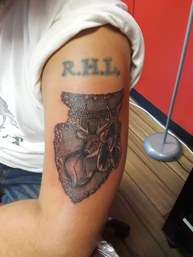 Explore black and grey half sleeve tattoo ideas, creative tattoo ideas in Newport, available at T N T Explosive Tattoo