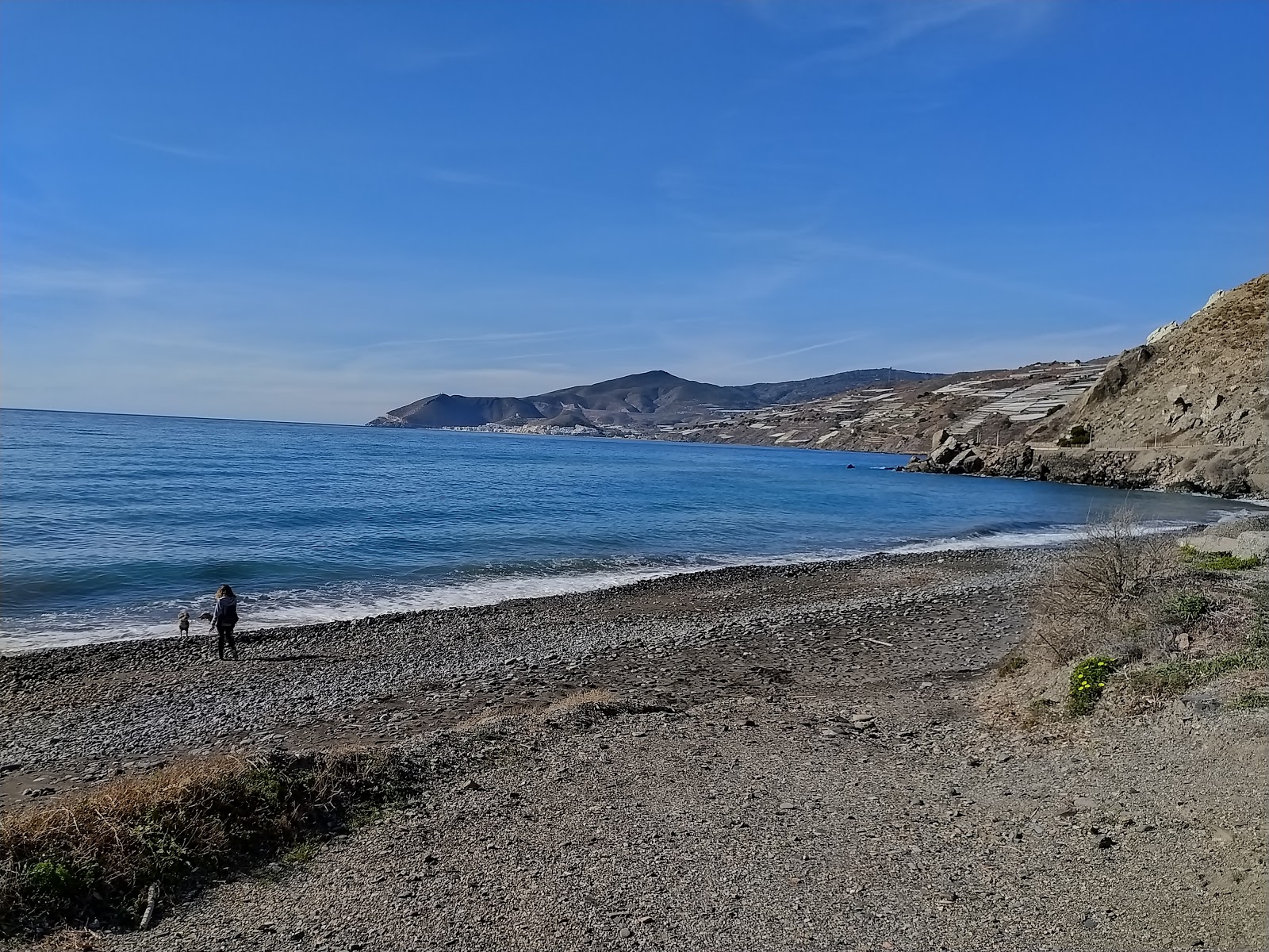 Foto de Caserones Beach con arena gris y guijarros superficie