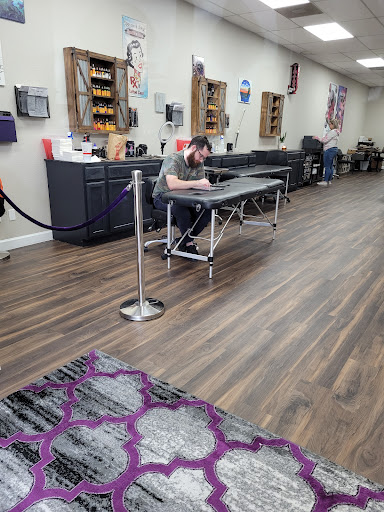 Explore lady thigh tattoo ideas, creative tattoo ideas in Ocala, available at Black Lotus Tattoo & Art Gallery Inc