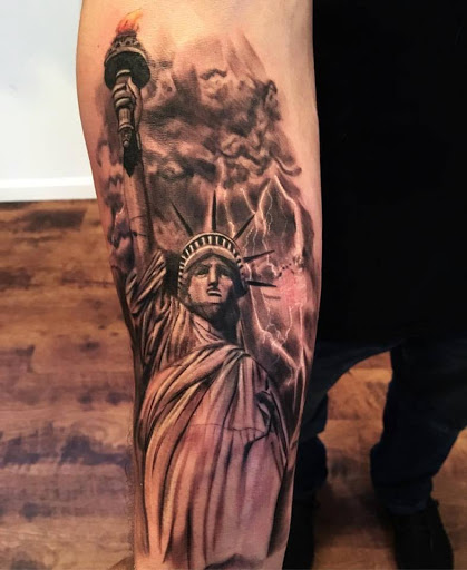 Explore male wedding ring tattoo ideas, creative tattoo ideas in Towson, available at Layer 3 Collective