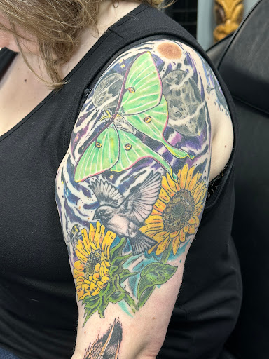 Explore forearm rose tattoo ideas, creative tattoo ideas in Aurora, available at Ronin Tattoo Studio INC