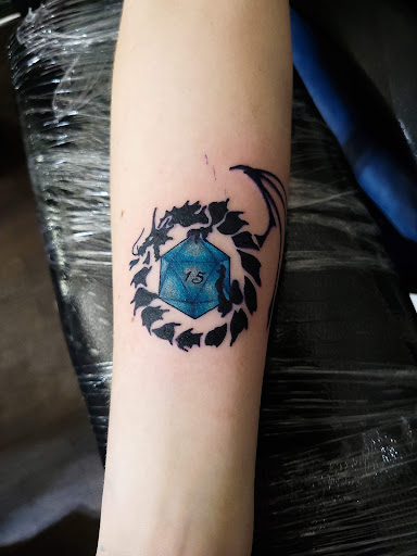 Explore cruise ship tattoo ideas, creative tattoo ideas in Windsor, available at Spillen Ink