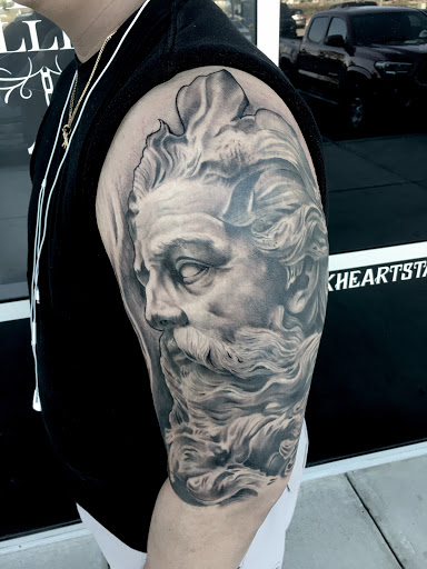 Explore grandkid tattoo ideas, creative tattoo ideas in Fontana, available at Dark Hearts Tattoo Gallery