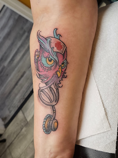 Explore tattoo name cover up ideas on wrist, creative tattoo ideas in Brunswick, available at Blue Fin Tattoos