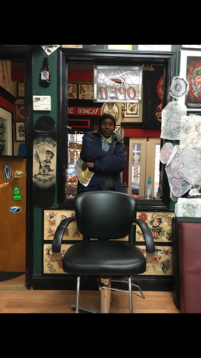 Tattoo Shop «Consolidated Tattoo», reviews and photos, 107 W Kearsley St, Flint, MI 48502, USA
