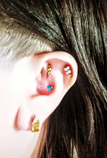 Explore cover up tattoo ideas for females, creative tattoo ideas in Toledo, available at 4 Nineteen Ink