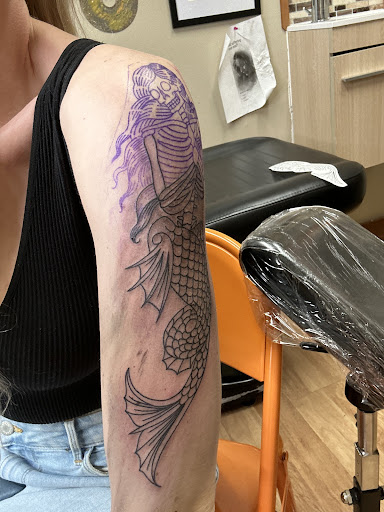 Find ouija board tattoo ideas for your next unique tattoo in Newport News at American Classic Tattoo