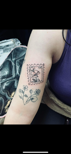 Explore side tattoo ideas for women, creative tattoo ideas in Nazareth, available at Nocturnal Tattoo