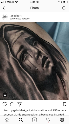 Explore men's behind the ear tattoo ideas, creative tattoo ideas in Hollywood, available at Sacred Eye Tattoos