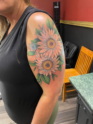 Explore handprint tattoo ideas, creative tattoo ideas in Orange Park, available at Big City Tattoo and Piercing