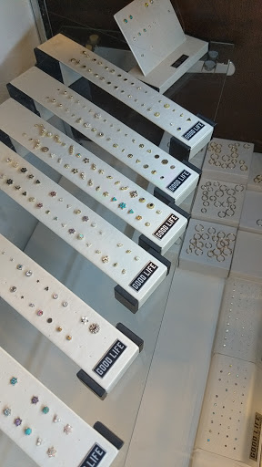 Explore tattoo name cover up ideas on wrist, creative tattoo ideas in Akron, available at Good Life Body Piercing and Fine Jewelry