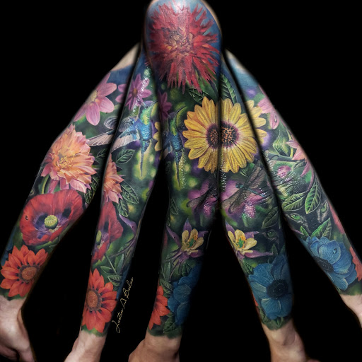 Explore book dragon tattoo ideas, creative tattoo ideas in Worcester, available at Studio 31 Tattoo Social Club