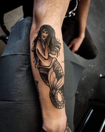 Explore spina bifida tattoo ideas, creative tattoo ideas in Snohomish, available at Unknown Tattoo Co.