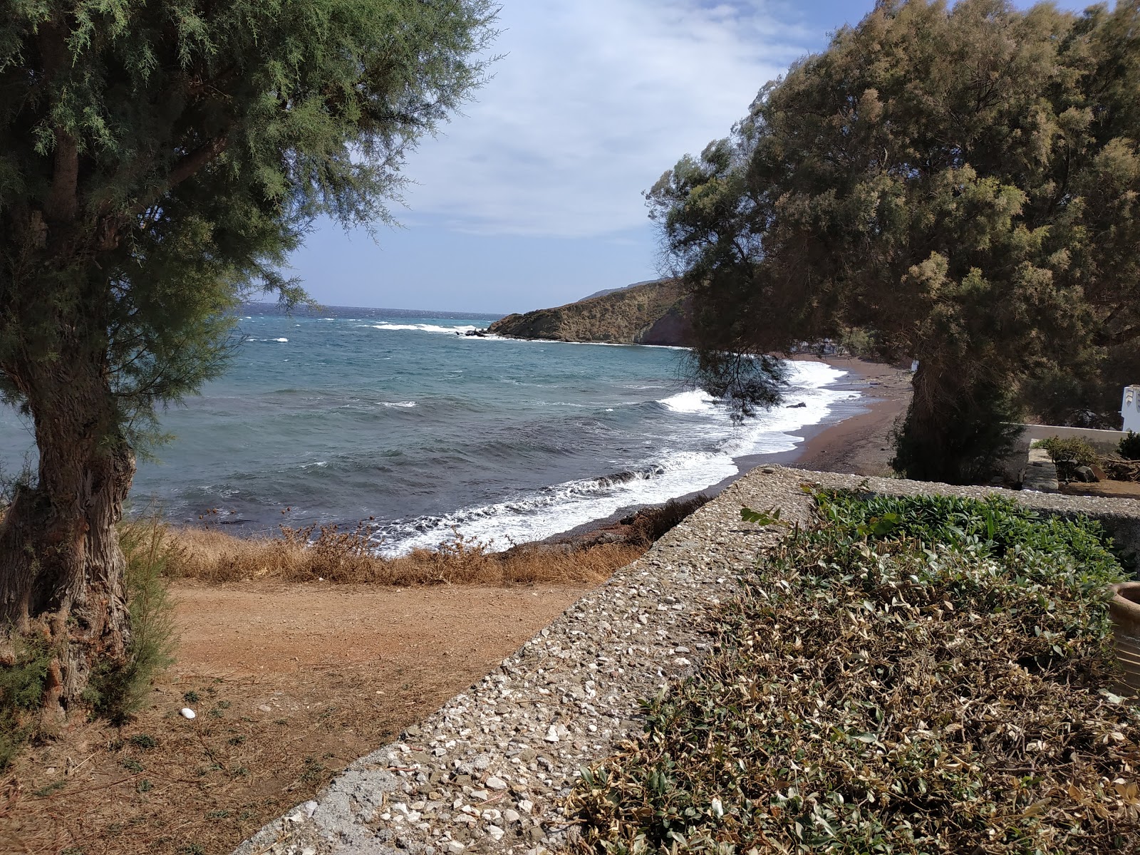 Foto von Paralia Firi Ammos und seine wunderschöne Landschaft