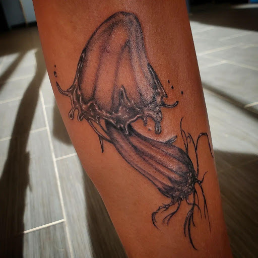 Explore faith over fear tattoo ideas, creative tattoo ideas in Palm Harbor, available at Angry Owl Tattoo and Piercing