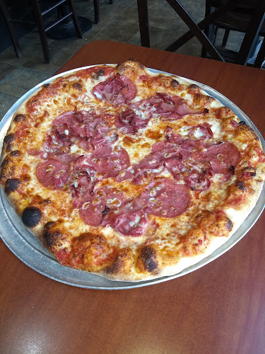 #1 best pizza place in Peabody - Plum Tomatoes Brick Oven Pizza