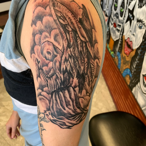 Explore chain tattoo ideas, creative tattoo ideas in Seymour, available at American Gypsy Tattoo Corp.