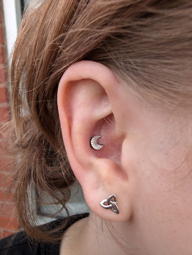 Explore ball python tattoo ideas, creative tattoo ideas in Salem, available at Thistle Piercing & Fine Jewelry