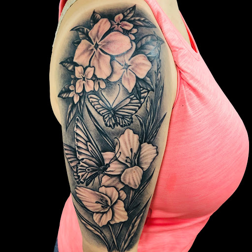 Explore black & white tattoo ideas, creative tattoo ideas in Peoria, available at Freedom Ink Tattoos