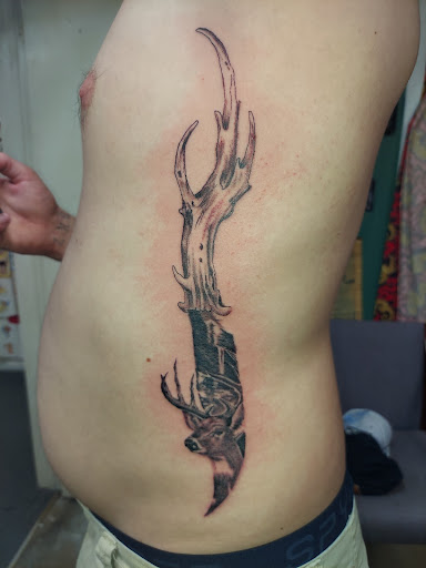 Explore american football tattoo ideas, creative tattoo ideas in Odessa, available at Little Dragon Tattoos Studio