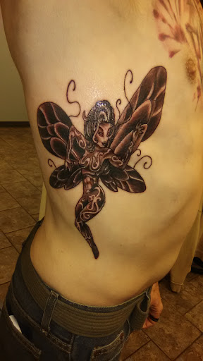 Explore xenomorph tattoo ideas, creative tattoo ideas in Fort Wayne, available at Grade A Tattoos and Body Piercing
