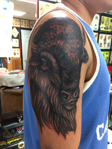 Explore simple arm tattoo ideas, creative tattoo ideas in Black River Falls, available at Black River Tattoo