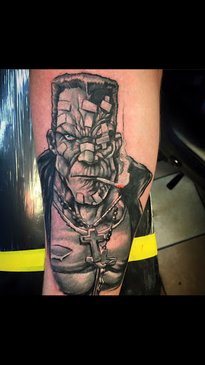 Explore witch hat tattoo ideas, creative tattoo ideas in Springfield, available at Newage Tattoos and Body Piercings