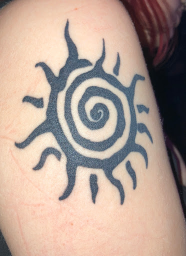 Explore ariana grande tattoo ideas, creative tattoo ideas in La Crosse, available at Mind Altering Tattoos