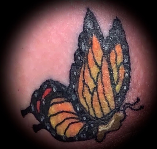 Explore tattoo ideas cross, creative tattoo ideas in Denison, available at Crossroads Tattoo Studio