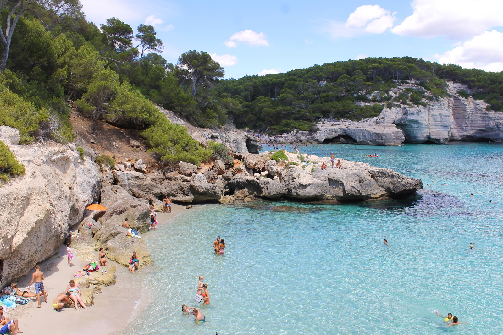 Photo of Cala Mitjaneta with turquoise pure water surface