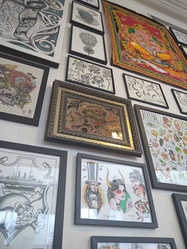 Explore small tattoo ideas for lower back, creative tattoo ideas in Savannah, available at Anonymous Tattoo