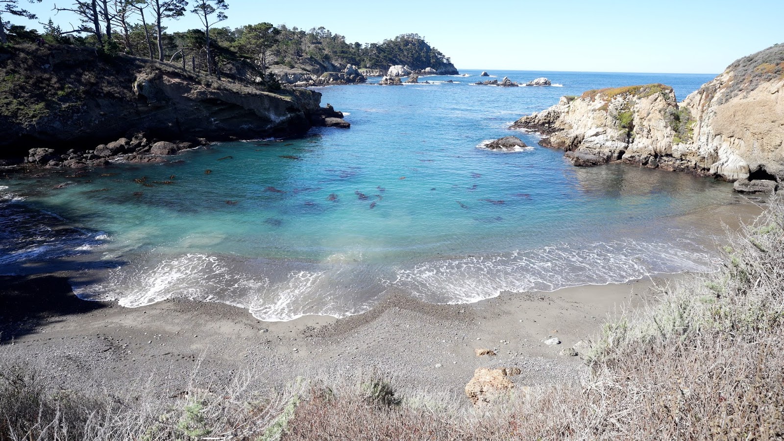 Photo of Granite Point Beach with gray pebble surface