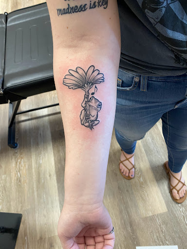 Explore snowboarding tattoo ideas, creative tattoo ideas in Davenport, available at Fine Ink Studios Tattoos