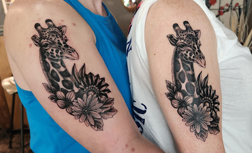 Explore purple rose tattoo ideas, creative tattoo ideas in Coquille, available at Inspired Ink Tattoo Shop
