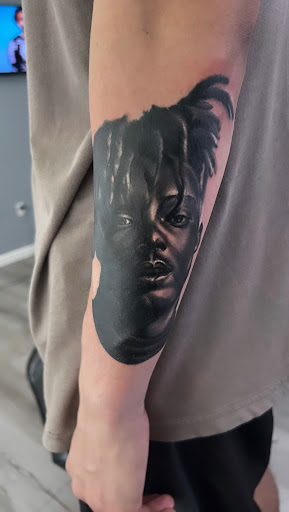 Explore man face tattoo ideas, creative tattoo ideas in Hattiesburg, available at Everything Prime Art Studio