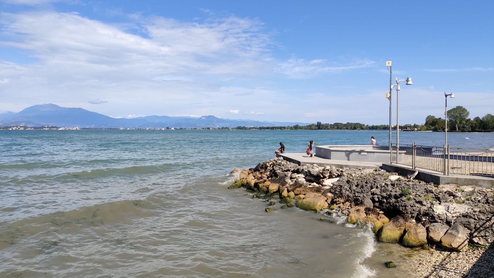 Fotografija Spiaggia della Cesolina z turkizna voda površino