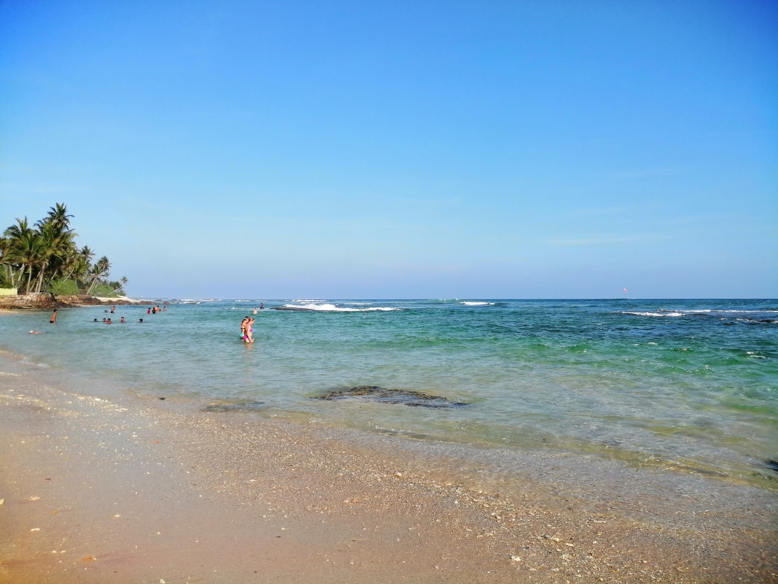 Zdjęcie Madiha Beach z poziomem czystości wysoki