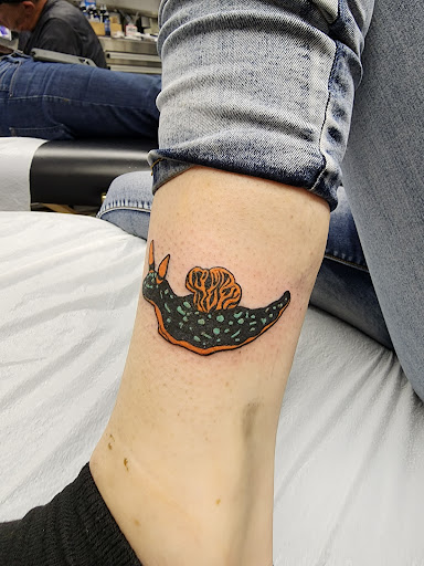 Explore brain tumor tattoo ideas, creative tattoo ideas in Canton, available at Hammers Tattoo & Body Piercing