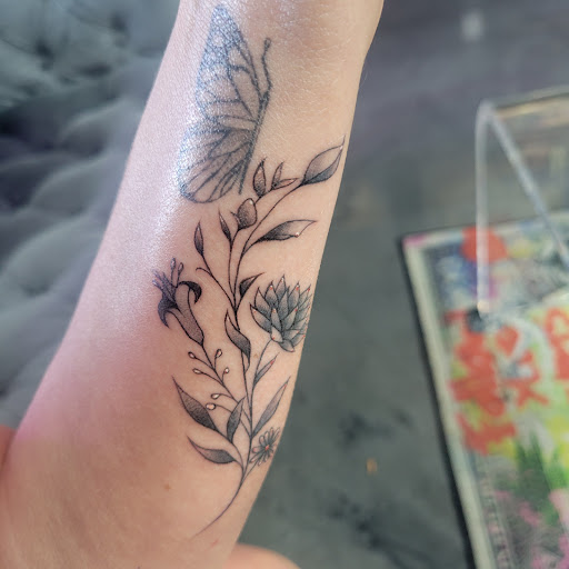 Explore half heart tattoo ideas, creative tattoo ideas in Hollywood, available at Sacred Eye Tattoos