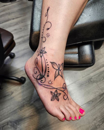 Explore aztec tattoo sleeve ideas, creative tattoo ideas in Cumberland, available at Queen City Ink