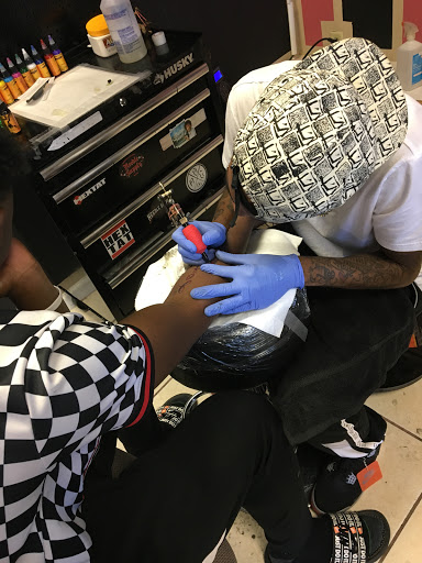 Explore male calf tattoo ideas, creative tattoo ideas in Birmingham, available at Ink Mob Studios