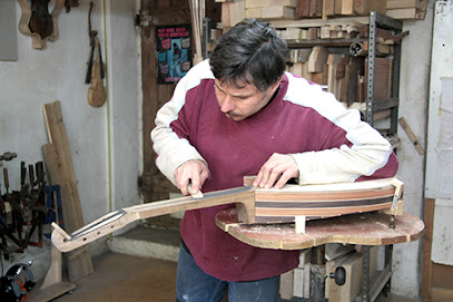 Stringed instrument maker