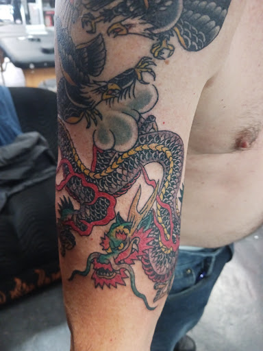 Explore patriotic forearm tattoo ideas, creative tattoo ideas in Port Angeles, available at Markd Body Art