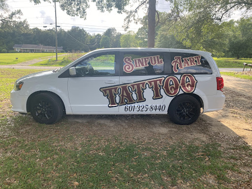 Explore head tattoo ideas for men, creative tattoo ideas in Hattiesburg, available at Sinful Aart Tattoo