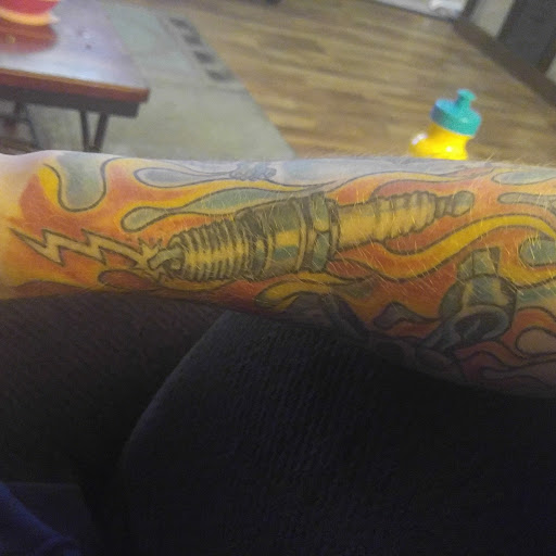 Explore ear tattoo ideas, creative tattoo ideas in Buffalo, available at Iron Horse South