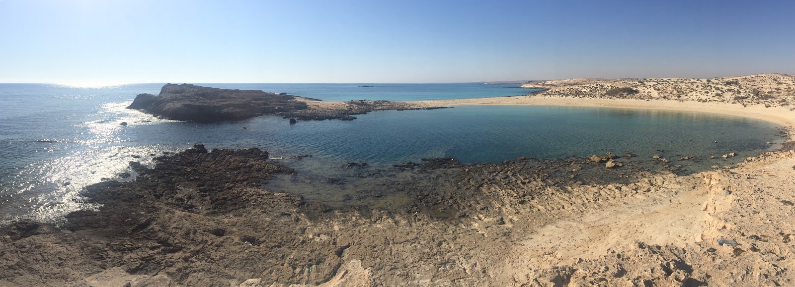 Foto van Ras El Hikma Beach met ruime baai