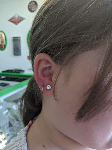 Explore sign language tattoo ideas, creative tattoo ideas in Redding, available at Caddy Daddys