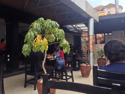 Cafe Ola - Shumuk House, Colville St, Kampala, Uganda