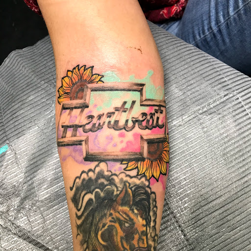 Explore chevy bowtie tattoo ideas, creative tattoo ideas in Monticello, available at 850 Tattoo Co.
